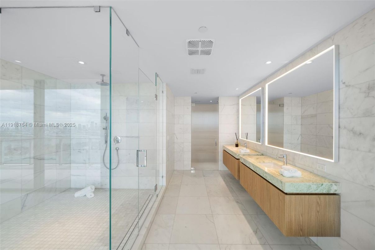 Bathroom, Dual Sink Vanities, Glass Shower, Interior, Marble Walls, Recessed Lighting