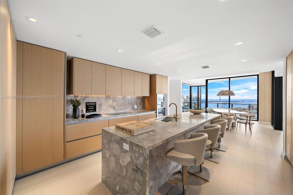 Dining room, Interior, Kitchen, Recessed Lighting, Stainless Steel Appliances, Water, Wood Texture Flooring
