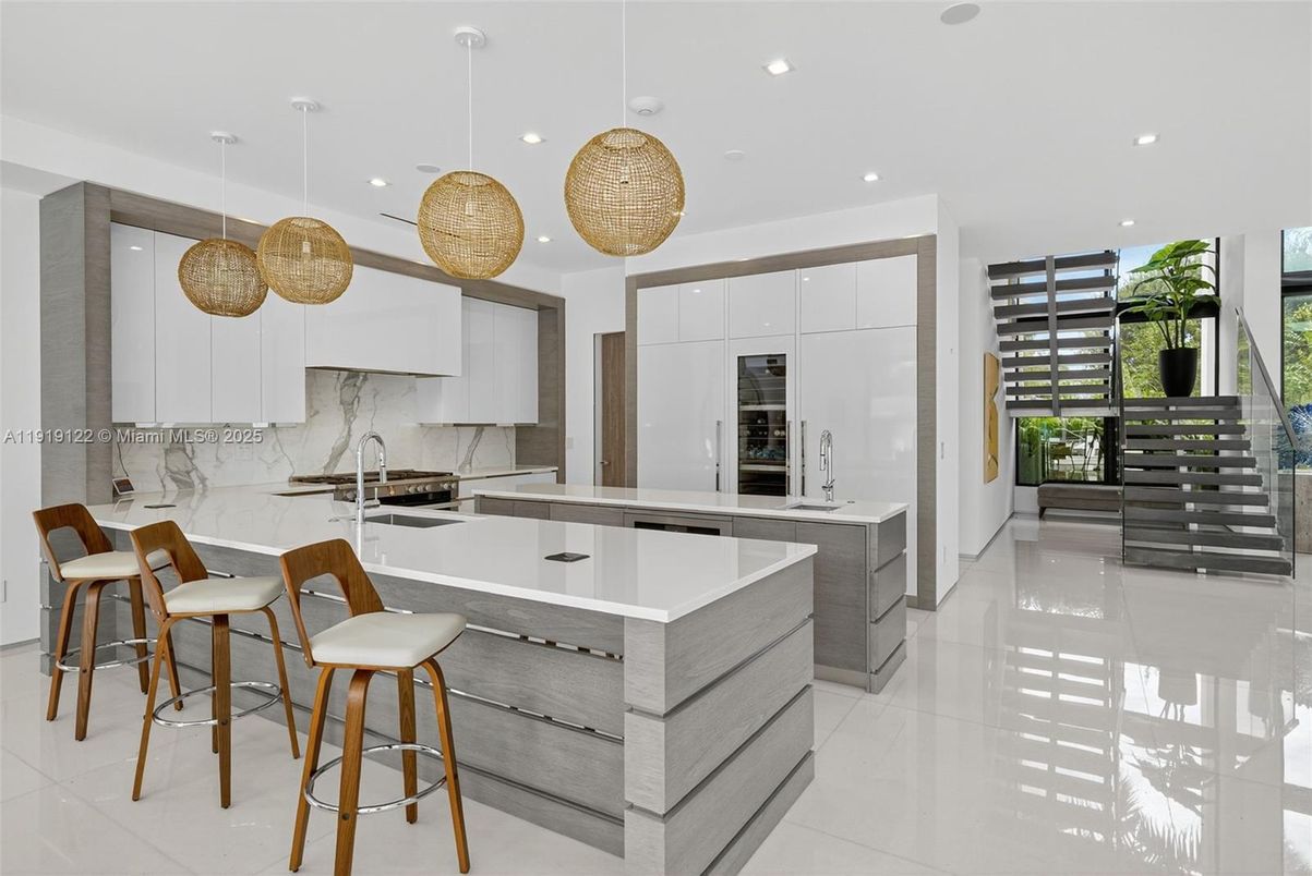 Interior, Kitchen, Marble Walls, Pendant Lights, Recessed Lighting, Stainless Steel Appliances