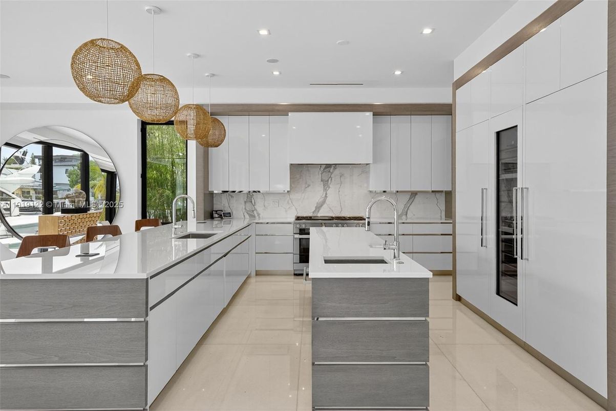Interior, Kitchen, Marble Walls, Pendant Lights, Recessed Lighting, Stainless Steel Appliances