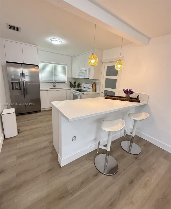 Interior, Kitchen, Pendant Lights, Stainless Steel Appliances, Wood Texture Flooring