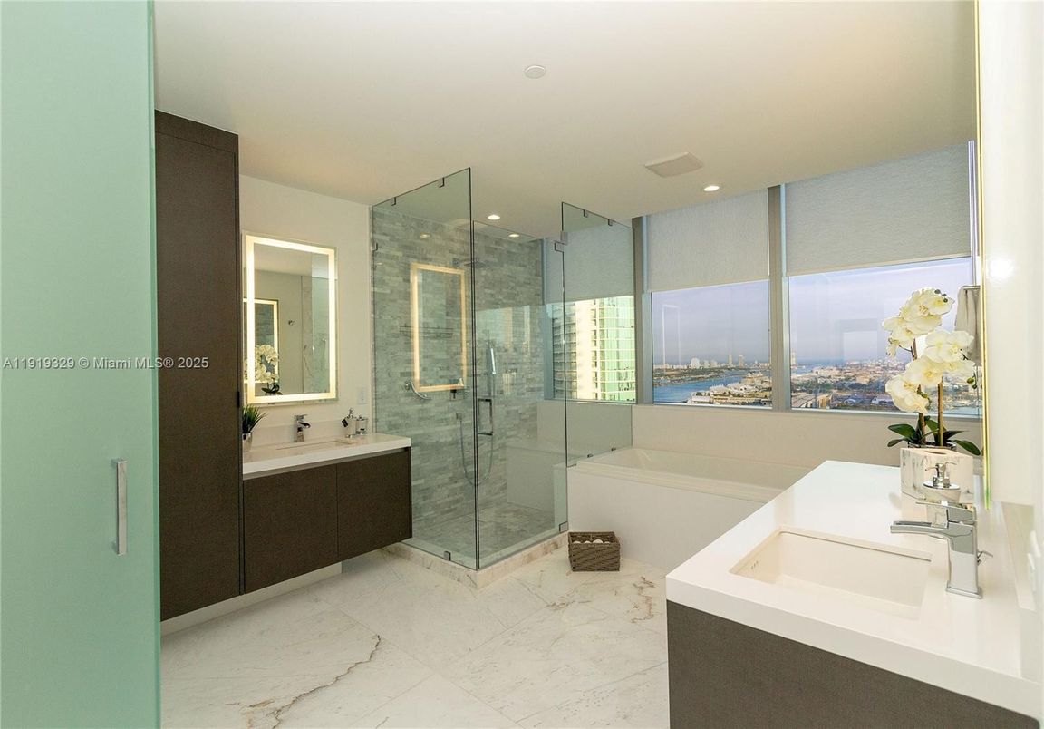 Bathroom, Dual Sink Vanities, Glass Shower, Interior, Marble, Recessed Lighting, Water