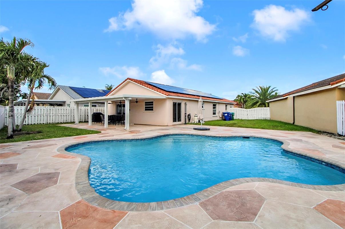 Exterior, Pool, Solar Panels