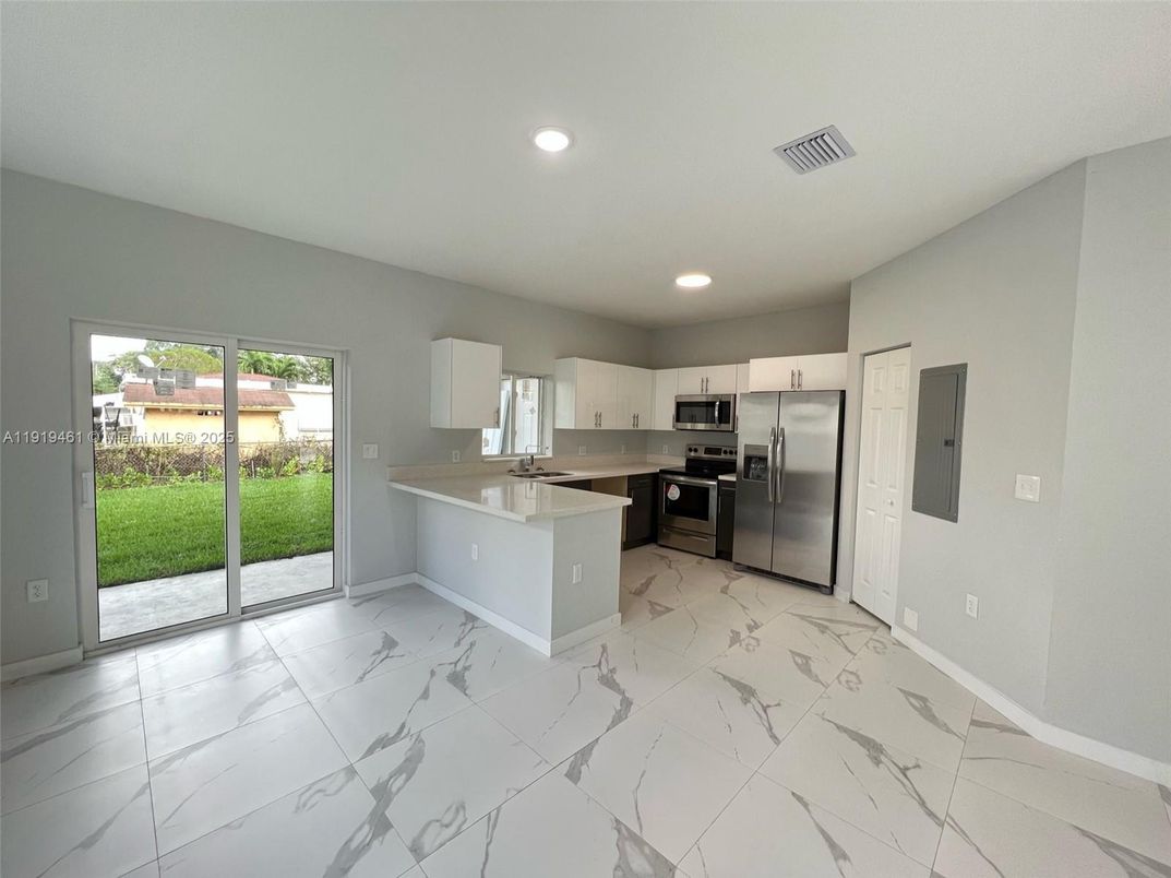 Interior, Kitchen, Marble, Recessed Lighting, Stainless Steel Appliances