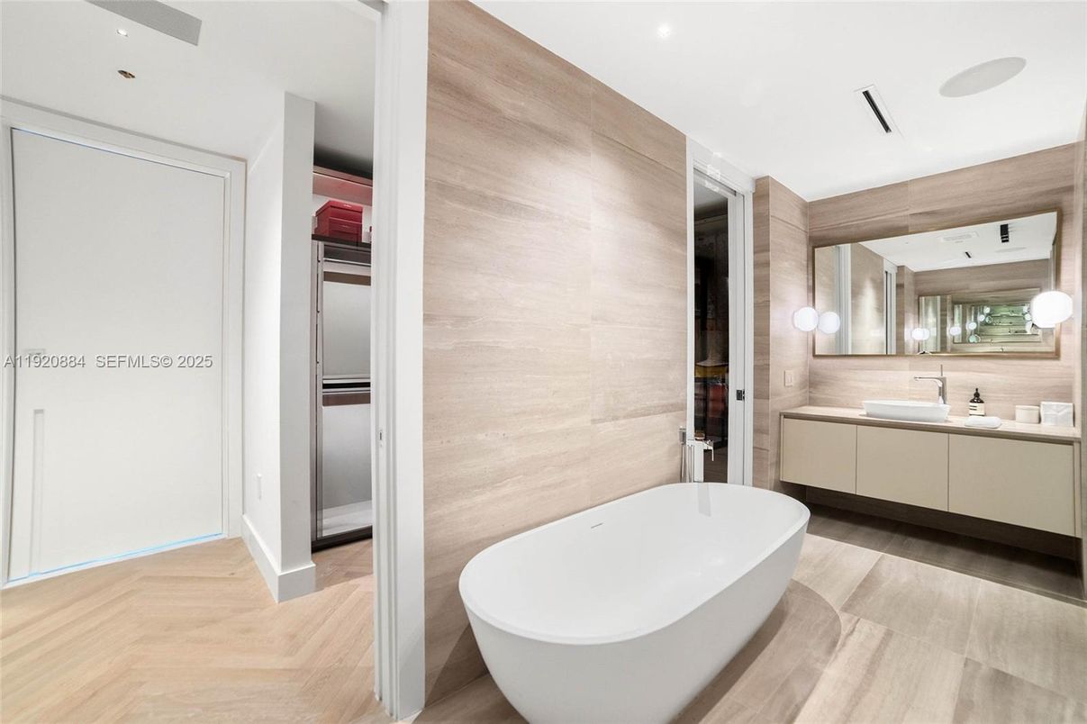 Bathroom, Dual Sink Vanities, Free Standing Baths, Interior, Pendant Lights, Recessed Lighting, Wood Texture Flooring