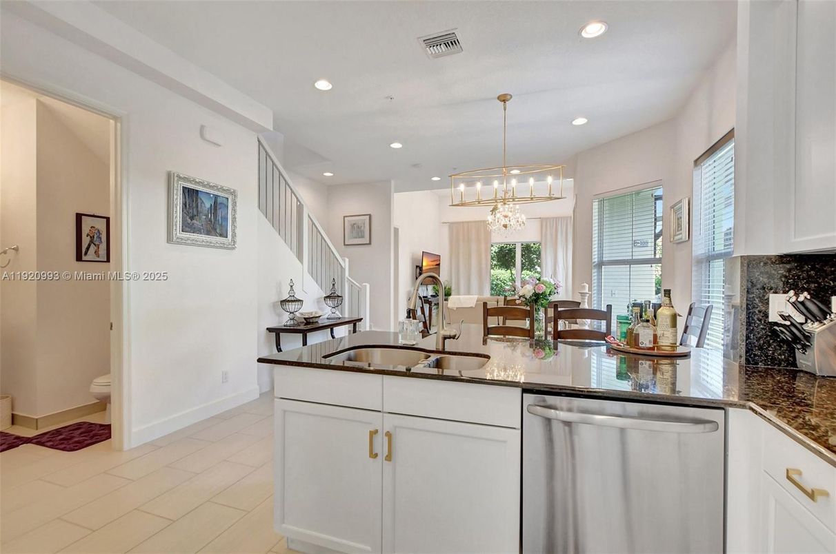 Chandelier, Dining room, Interior, Kitchen, Pendant Lights, Recessed Lighting, Stainless Steel Appliances