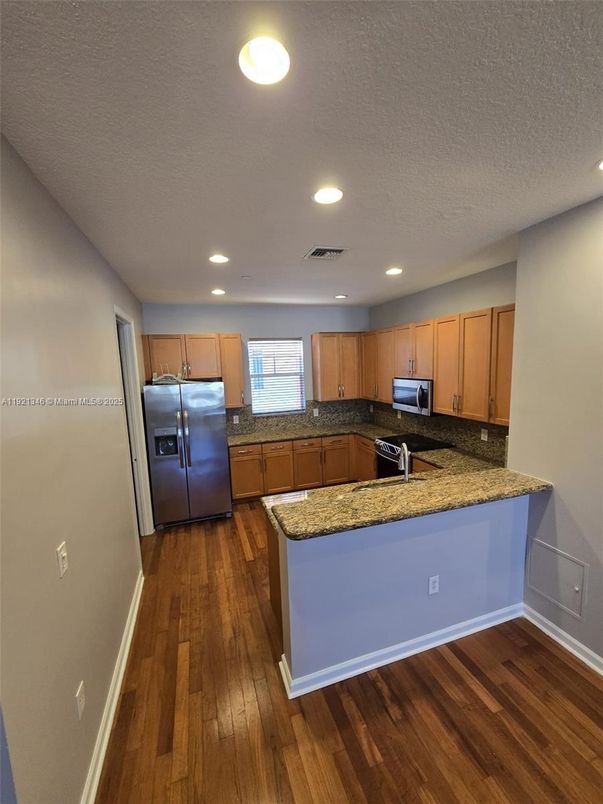 Interior, Kitchen, Recessed Lighting, Stainless Steel Appliances, Wood Texture Flooring