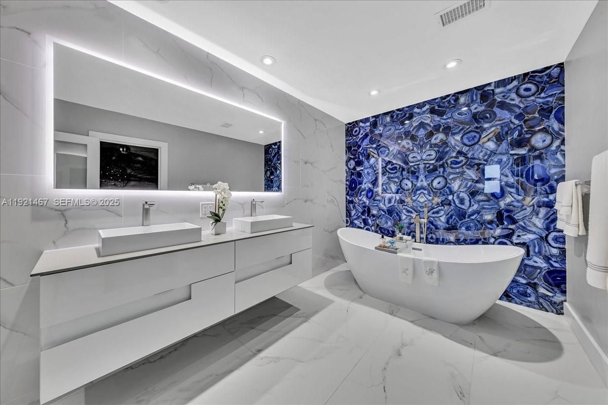 Bathroom, Dual Sink Vanities, Free Standing Baths, Interior, Marble, Marble Walls, Recessed Lighting