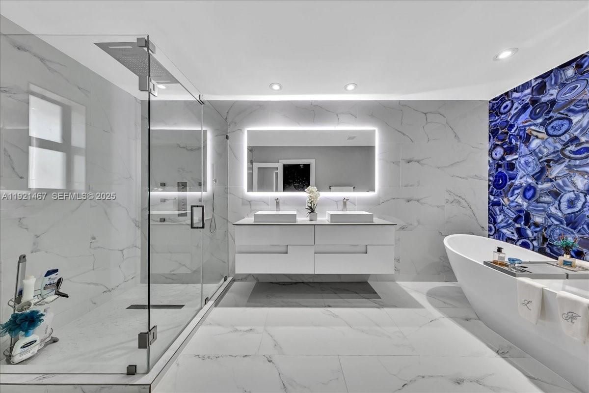 Bathroom, Dual Sink Vanities, Free Standing Baths, Glass Shower, Interior, Marble, Marble Walls, Recessed Lighting