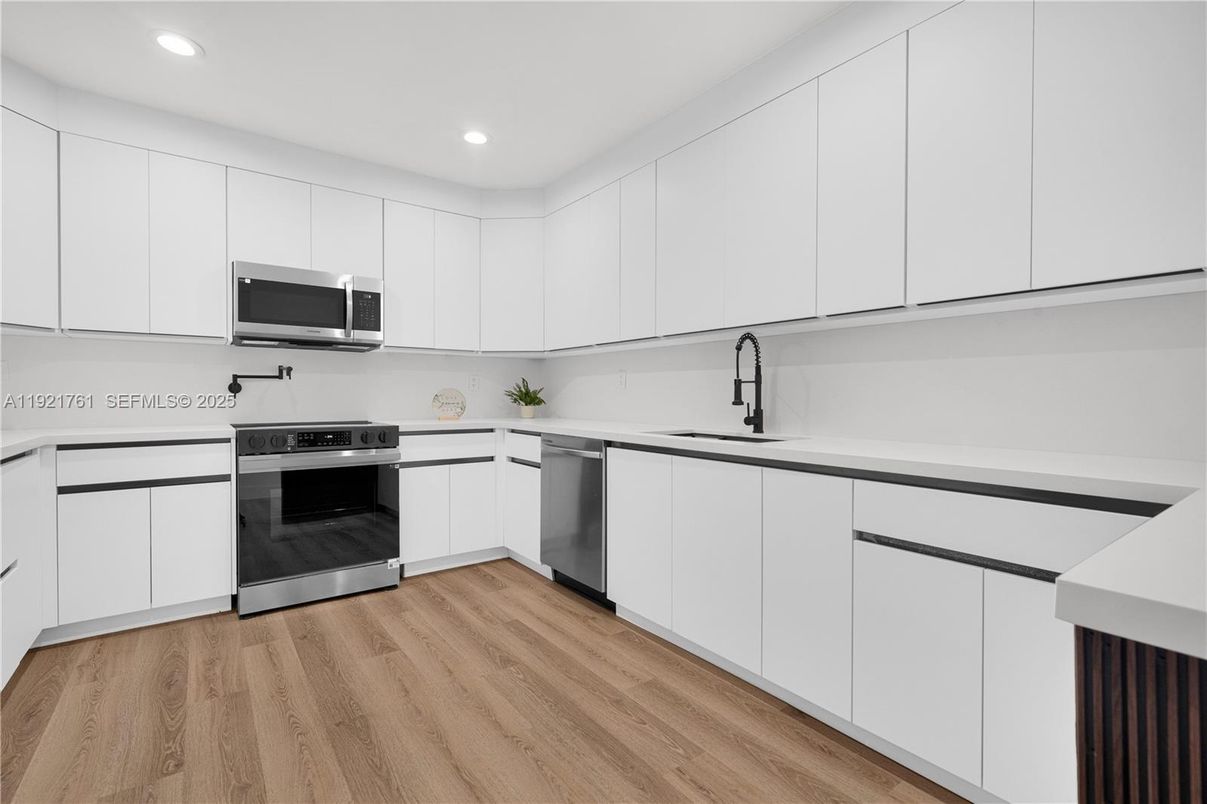 Interior, Kitchen, Recessed Lighting, Stainless Steel Appliances, Wood Texture Flooring