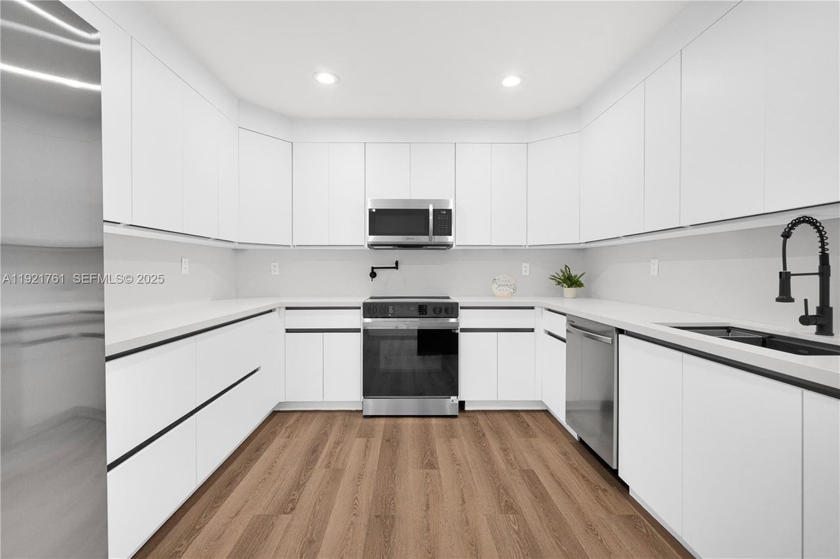 Interior, Kitchen, Recessed Lighting, Stainless Steel Appliances, Wood Texture Flooring