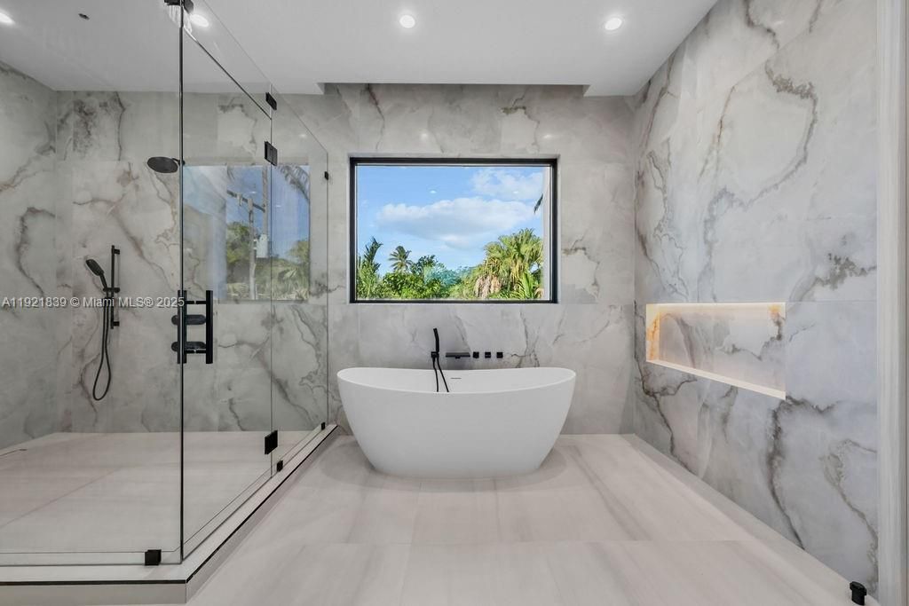 Bathroom, Free Standing Baths, Glass Shower, Interior, Marble Walls, Recessed Lighting