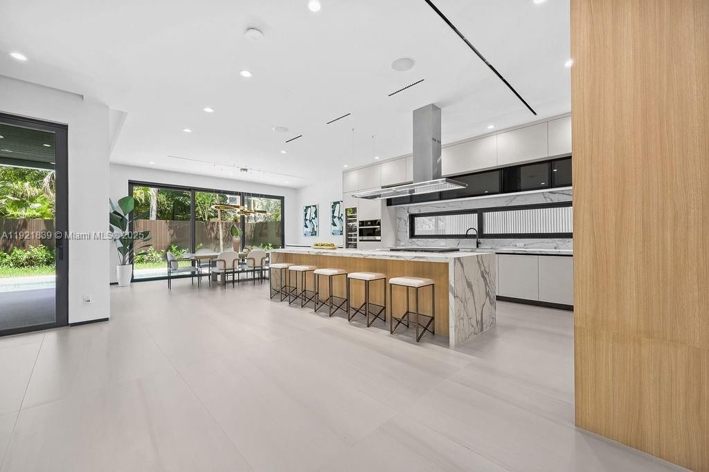 Dining room, Interior, Kitchen, Marble Walls, Recessed Lighting, Stainless Steel Appliances