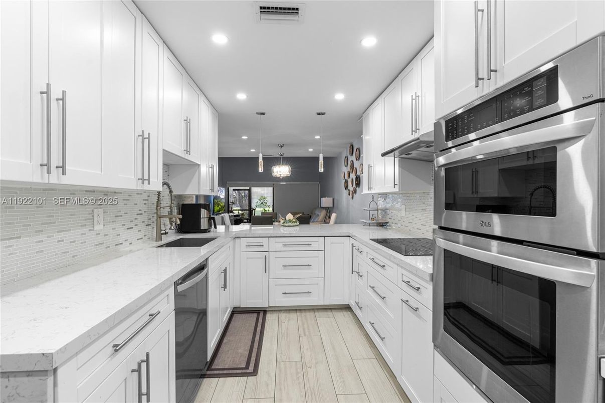 Interior, Kitchen, Pendant Lights, Recessed Lighting, Stainless Steel Appliances, Wood Texture Flooring