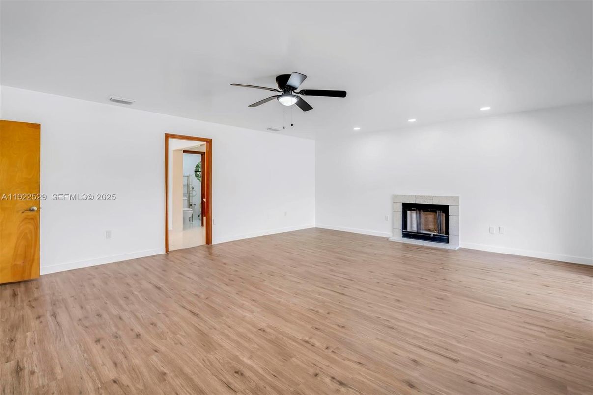 Empty room, Fireplace, Interior, Recessed Lighting, Wood Texture Flooring