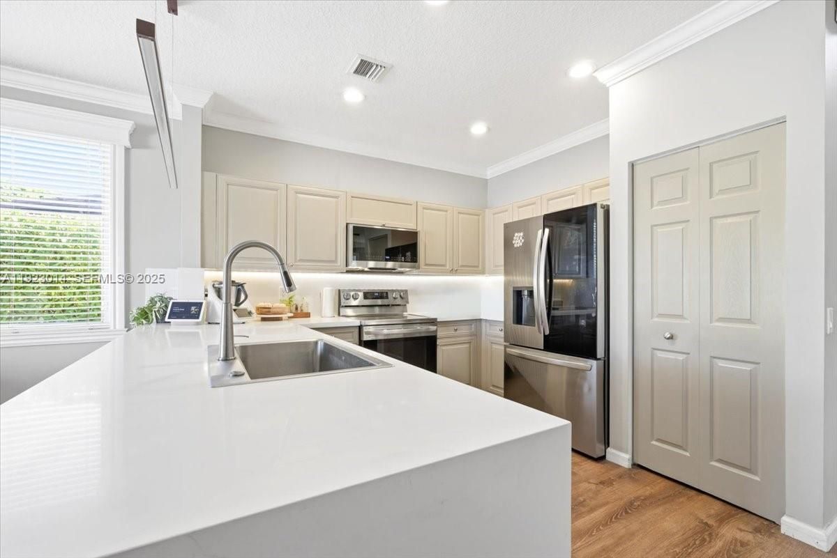 Interior, Kitchen, Recessed Lighting, Stainless Steel Appliances, Wood Texture Flooring