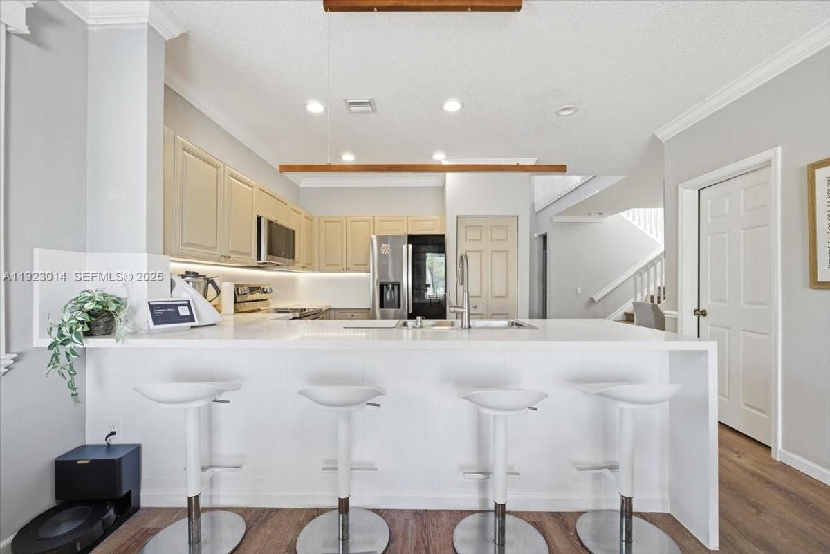 Interior, Kitchen, Recessed Lighting, Stainless Steel Appliances, Wood Texture Flooring