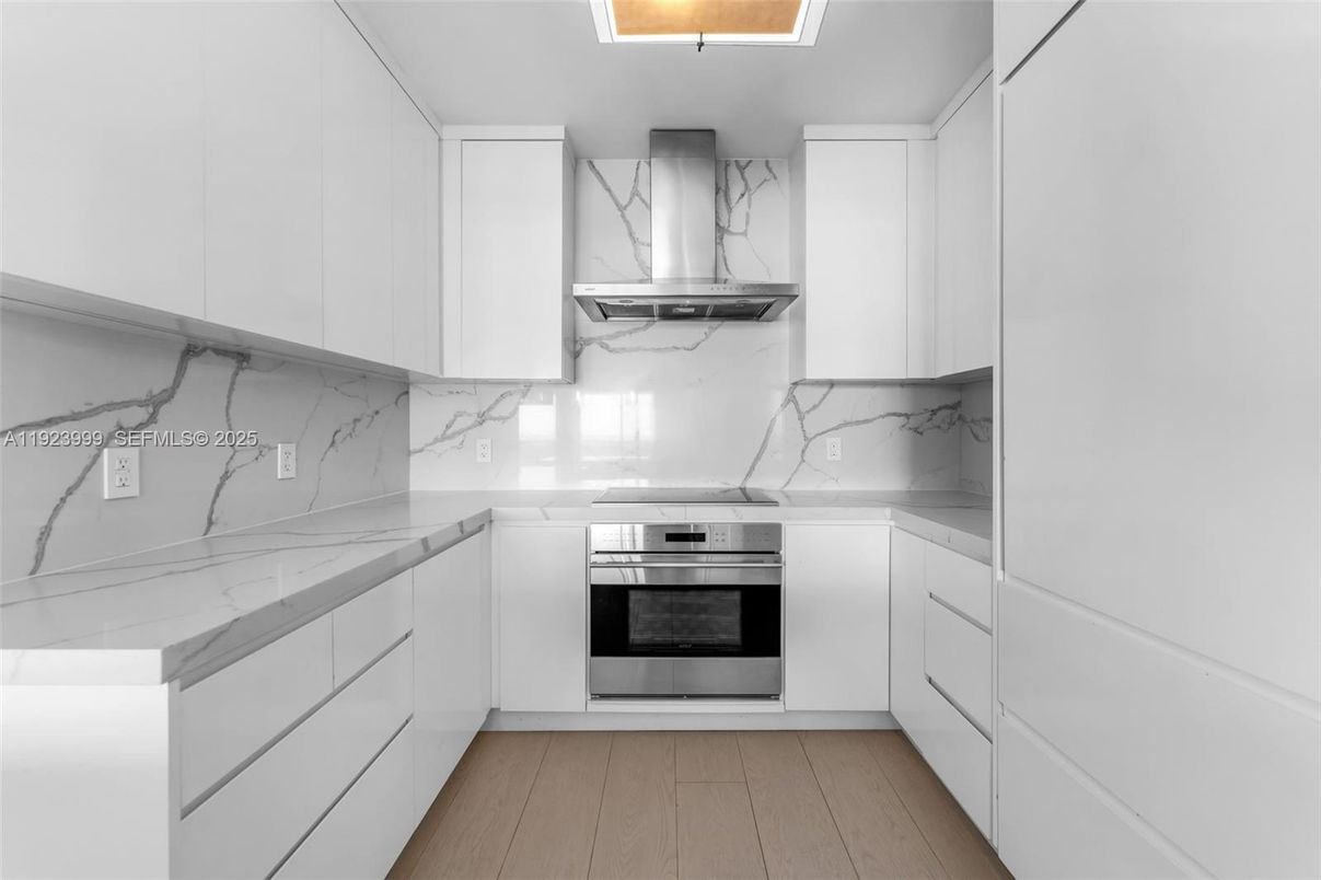 Interior, Kitchen, Marble Walls, Stainless Steel Appliances, Wood Texture Flooring