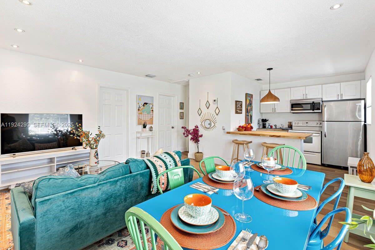 Dining room, Interior, Kitchen, Living room, Pendant Lights, Recessed Lighting, Stainless Steel Appliances, Wood Texture Flooring