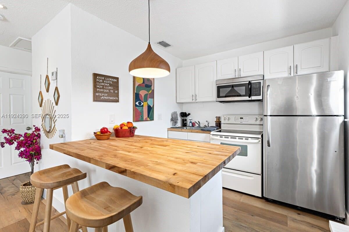 Interior, Kitchen, Pendant Lights, Stainless Steel Appliances, Wood Texture Flooring