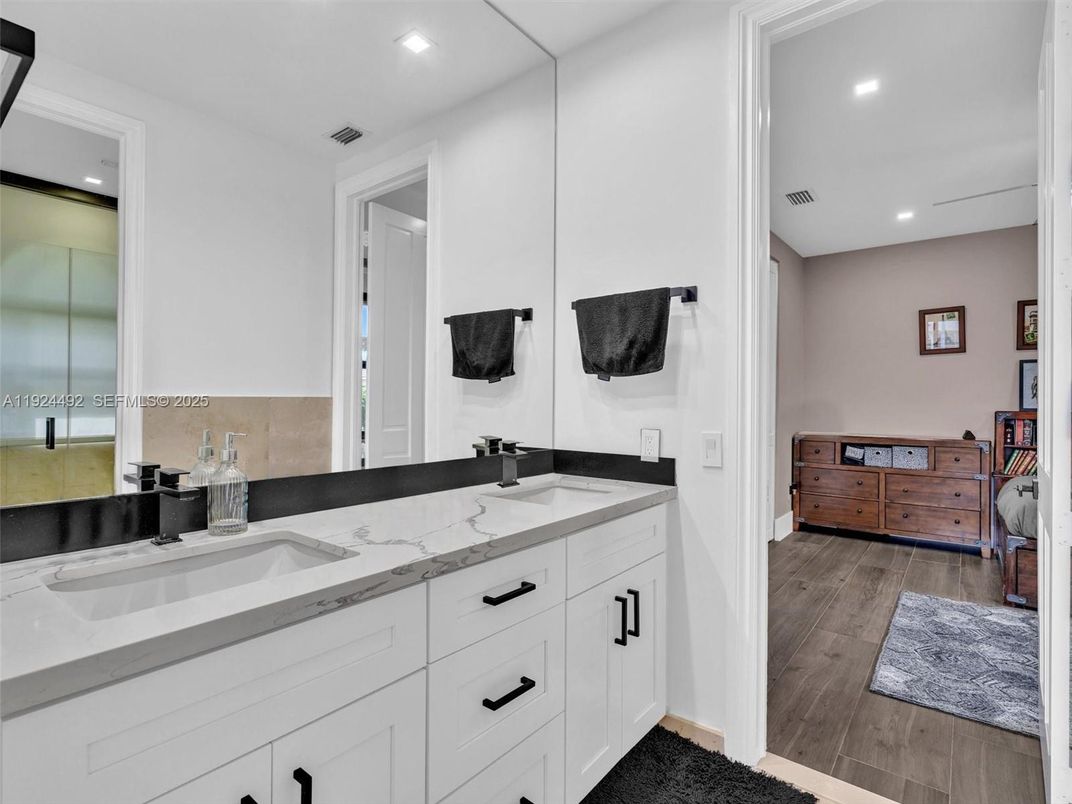 Bathroom, Dual Sink Vanities, Interior, Recessed Lighting, Wood Texture Flooring