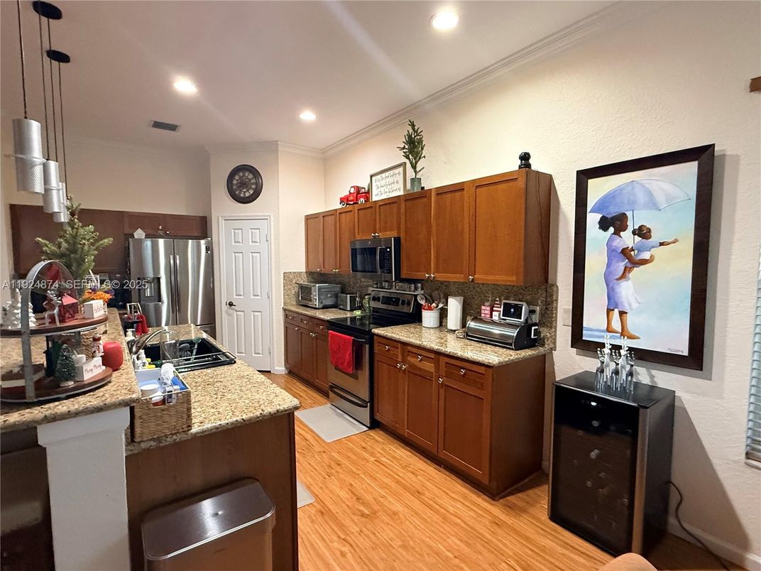 Interior, Kitchen, Pendant Lights, Recessed Lighting, Stainless Steel Appliances, Wood Texture Flooring