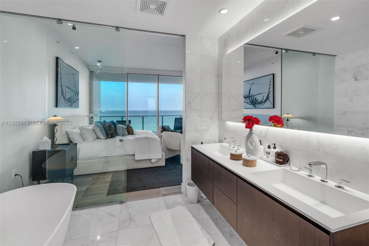 Bathroom, Bedroom, Dual Sink Vanities, Free Standing Baths, Glass Shower, Interior, Marble, Marble Walls, Recessed Lighting, Water