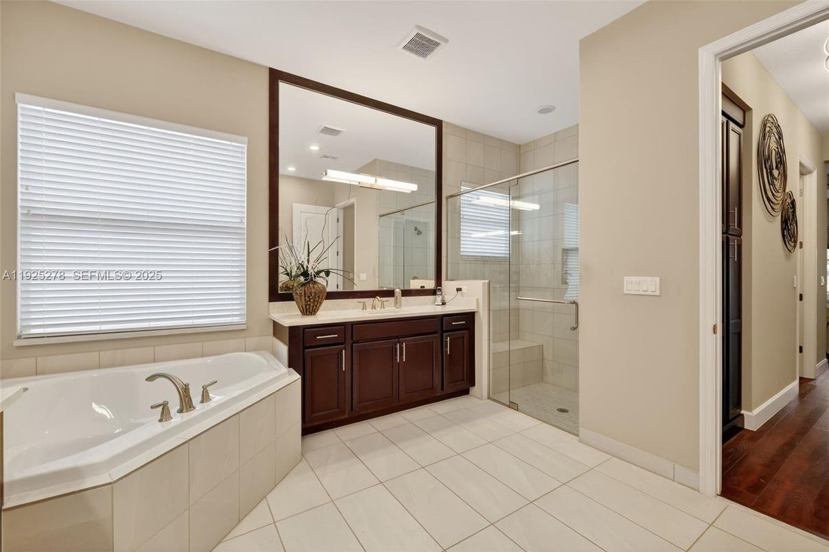 Bathroom, Dual Sink Vanities, Glass Shower, Interior, Recessed Lighting, Wood Texture Flooring
