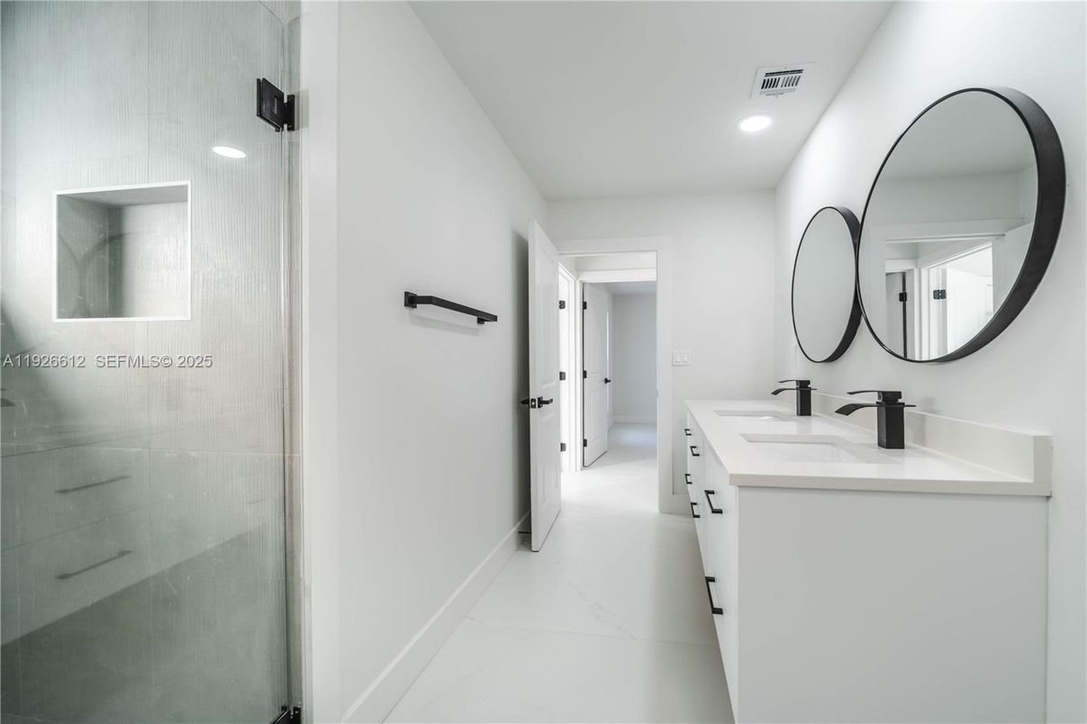 Bathroom, Dual Sink Vanities, Glass Shower, Interior, Marble, Recessed Lighting