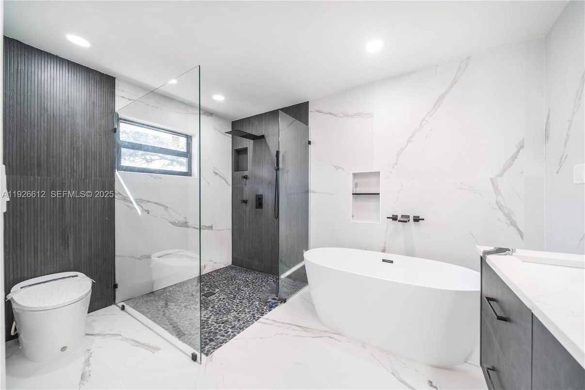 Bathroom, Free Standing Baths, Glass Shower, Interior, Marble, Marble Walls, Recessed Lighting