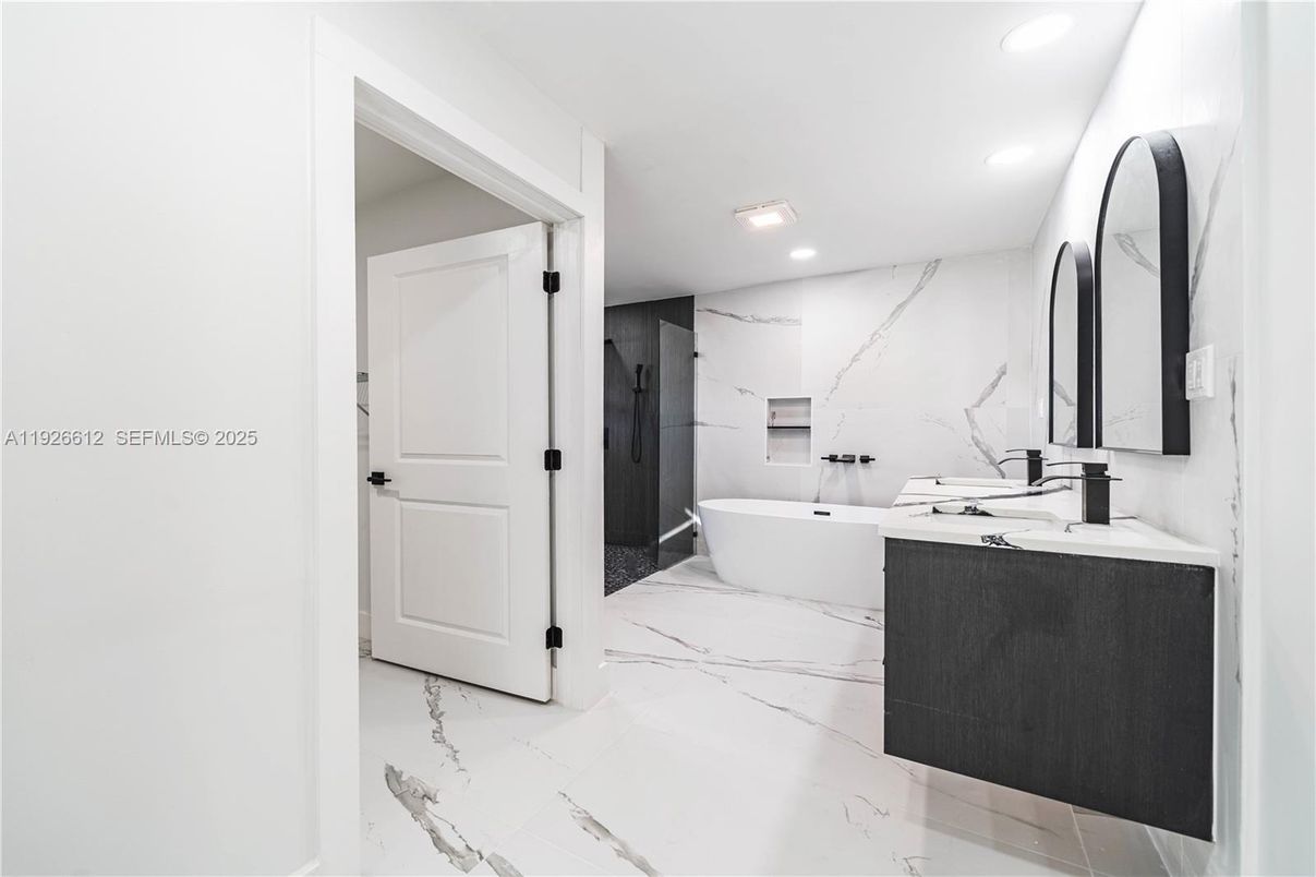 Bathroom, Dual Sink Vanities, Free Standing Baths, Interior, Marble, Marble Walls, Recessed Lighting