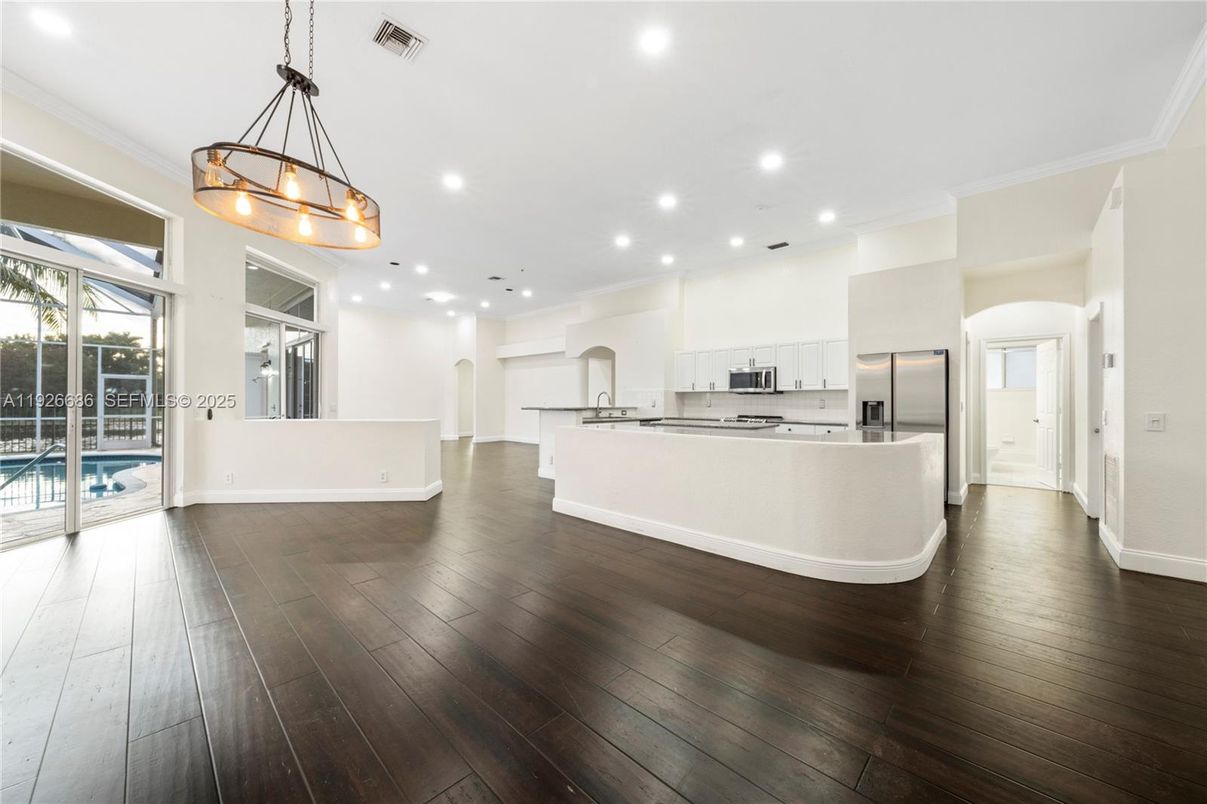 Interior, Kitchen, Pendant Lights, Recessed Lighting, Stainless Steel Appliances, Wood Texture Flooring