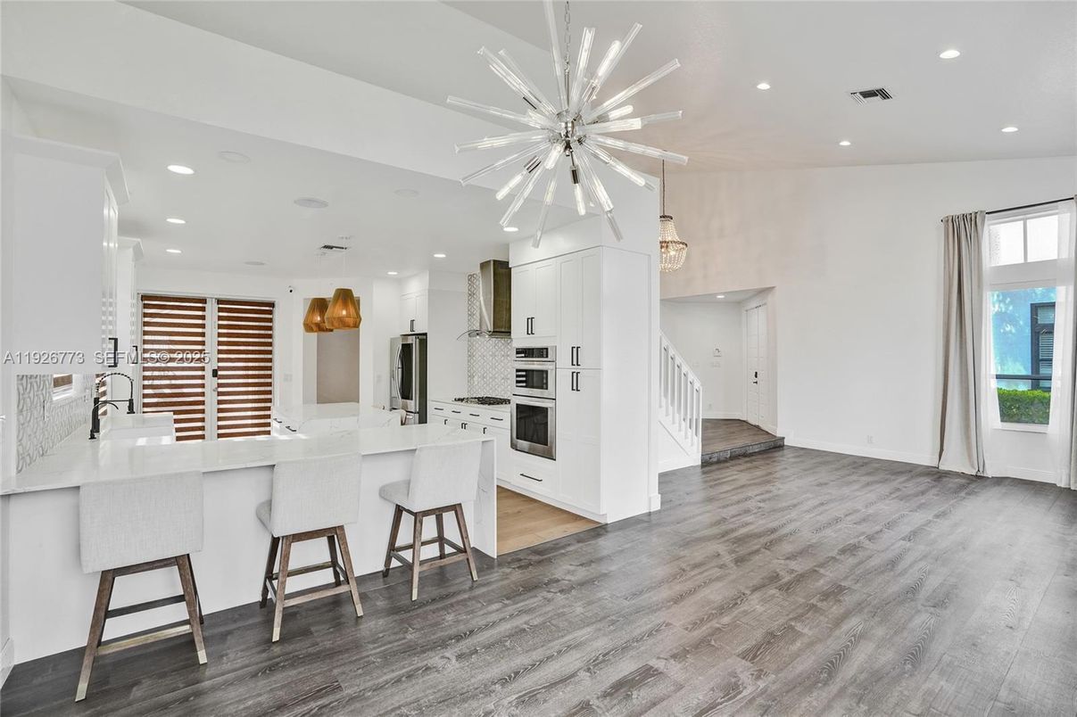 Interior, Kitchen, Pendant Lights, Recessed Lighting, Stainless Steel Appliances, Wood Texture Flooring