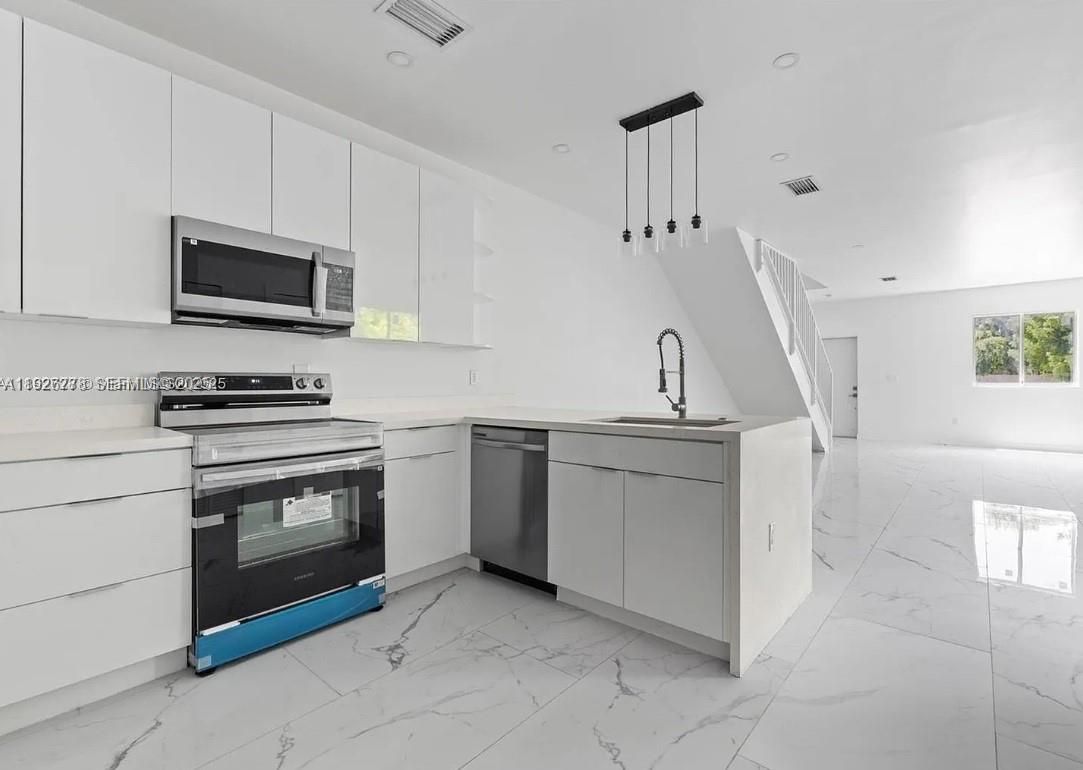 Interior, Kitchen, Marble, Pendant Lights, Recessed Lighting, Stainless Steel Appliances