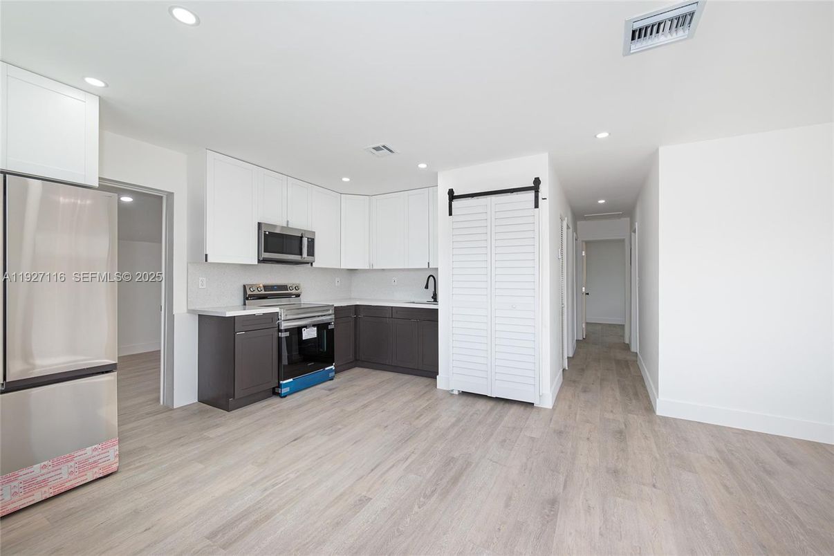 Interior, Kitchen, Recessed Lighting, Stainless Steel Appliances, Wood Texture Flooring