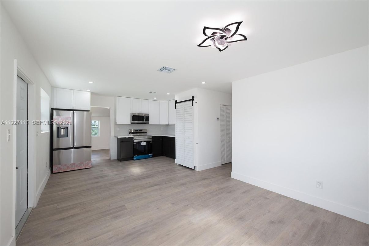 Interior, Kitchen, Recessed Lighting, Stainless Steel Appliances, Wood Texture Flooring
