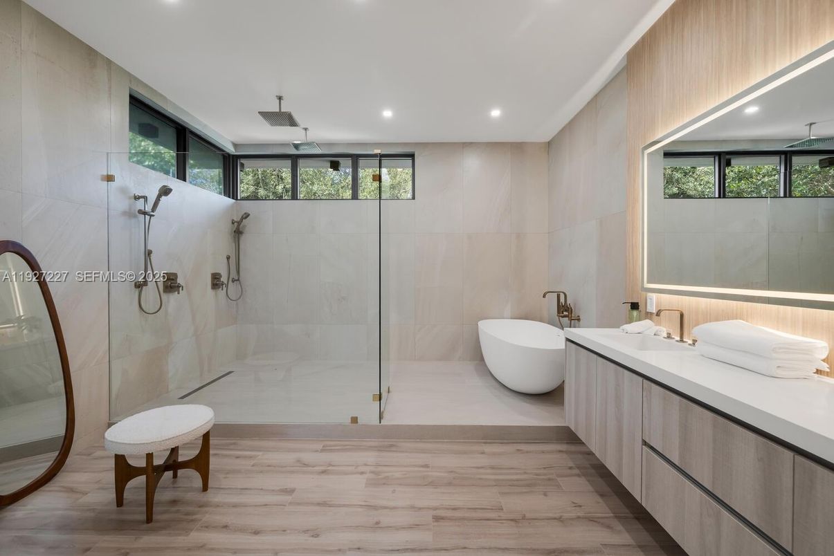 Bathroom, Dual Sink Vanities, Free Standing Baths, Glass Shower, Interior, Recessed Lighting, Wood Texture Flooring