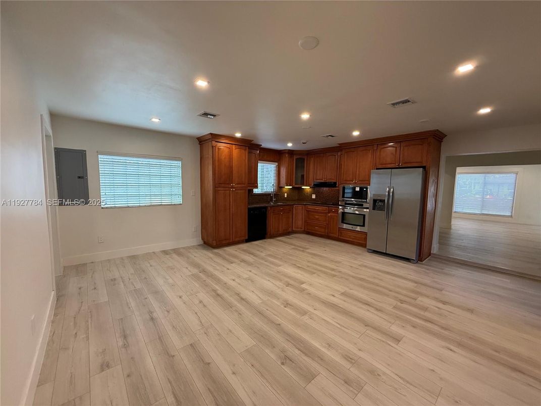 Interior, Kitchen, Recessed Lighting, Stainless Steel Appliances, Wood Texture Flooring