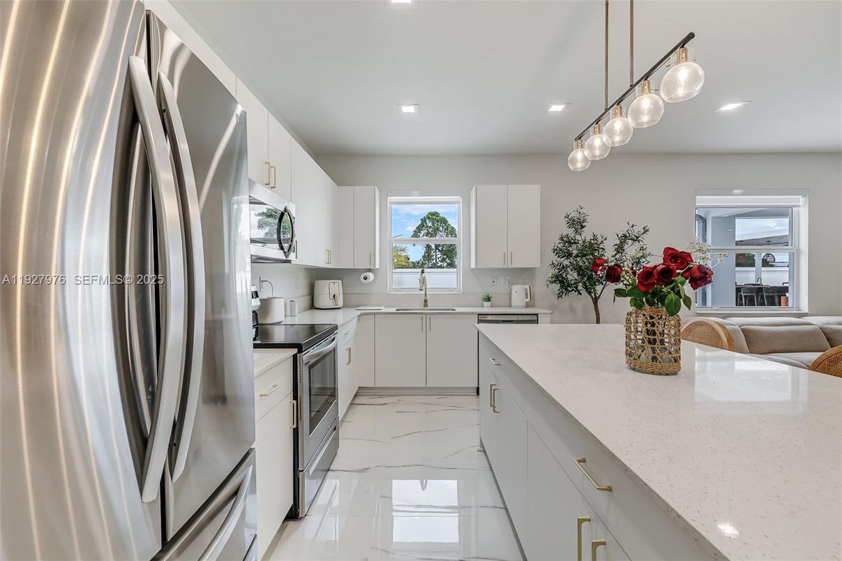 Interior, Kitchen, Marble, Pendant Lights, Recessed Lighting, Stainless Steel Appliances