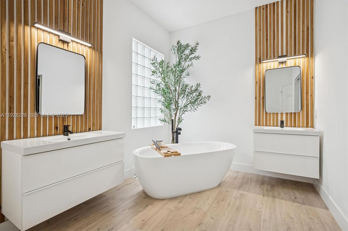 Bathroom, Dual Sink Vanities, Free Standing Baths, Interior, Wood Texture Flooring, Wooden Walls