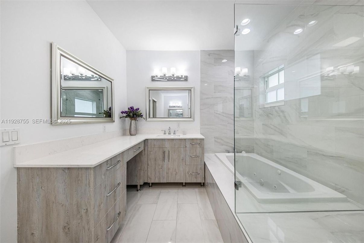 Bathroom, Dual Sink Vanities, Glass Shower, Interior, Marble Walls, Recessed Lighting