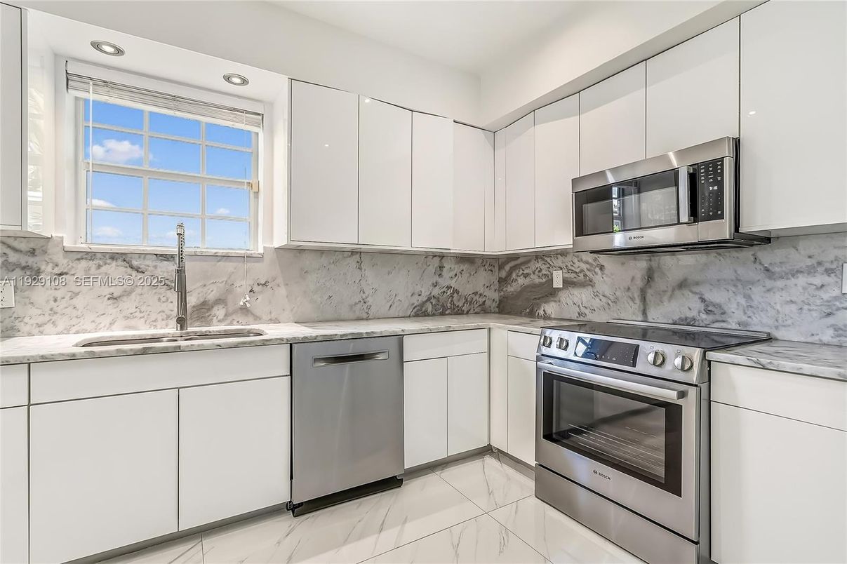 Interior, Kitchen, Marble, Marble Walls, Recessed Lighting, Stainless Steel Appliances