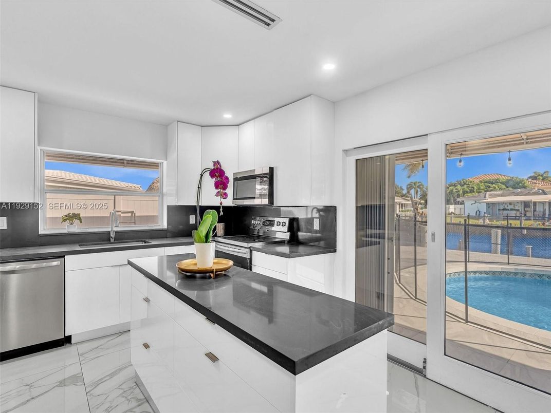 Interior, Kitchen, Marble, Recessed Lighting, Stainless Steel Appliances, Water