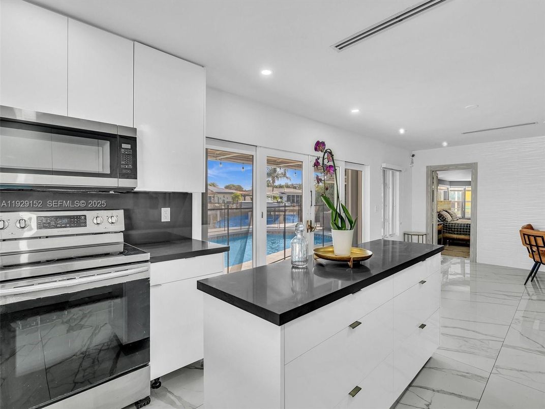 Interior, Kitchen, Marble, Recessed Lighting, Stainless Steel Appliances, Water