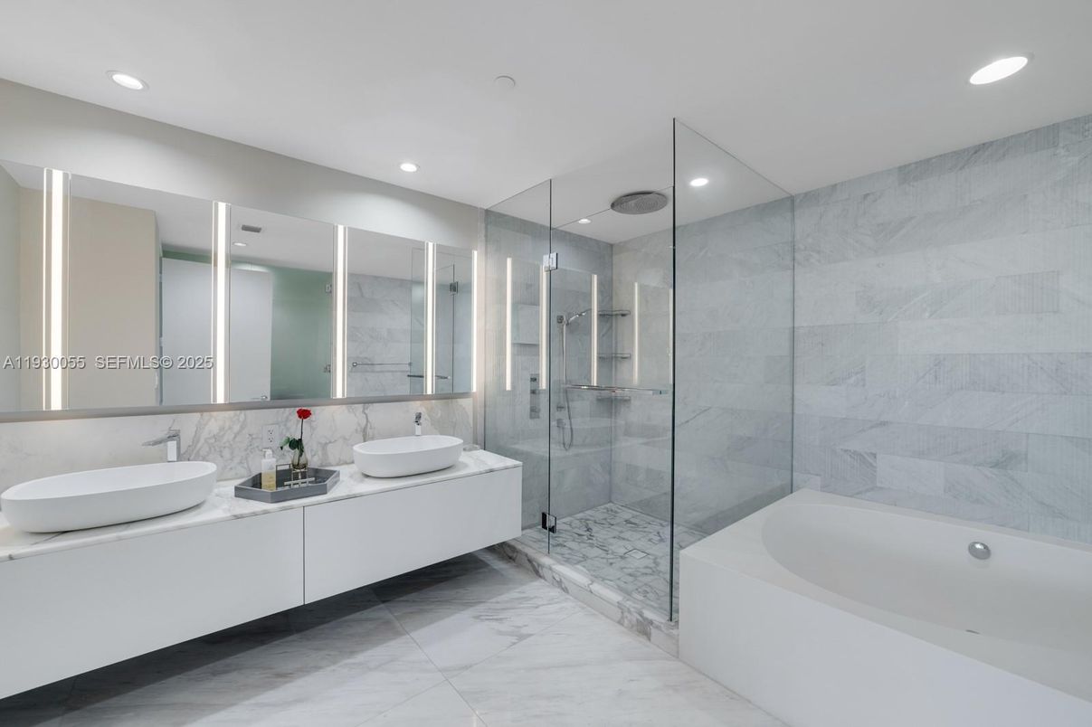 Bathroom, Dual Sink Vanities, Glass Shower, Interior, Marble, Marble Walls, Recessed Lighting