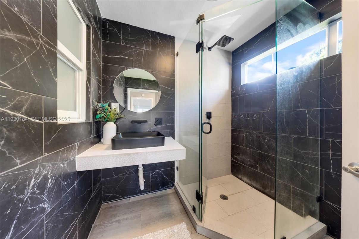 Bathroom, Glass Shower, Interior, Marble Walls, Wood Texture Flooring