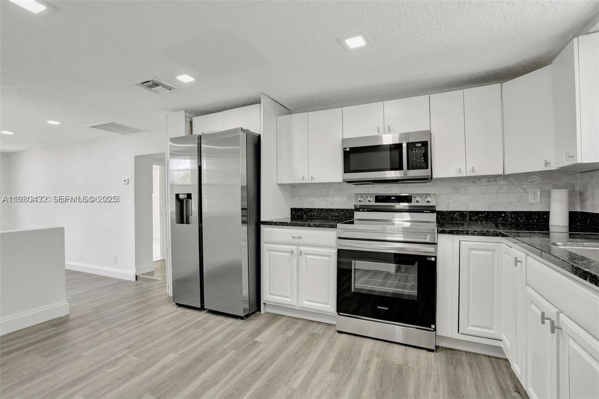 Interior, Kitchen, Recessed Lighting, Stainless Steel Appliances, Wood Texture Flooring