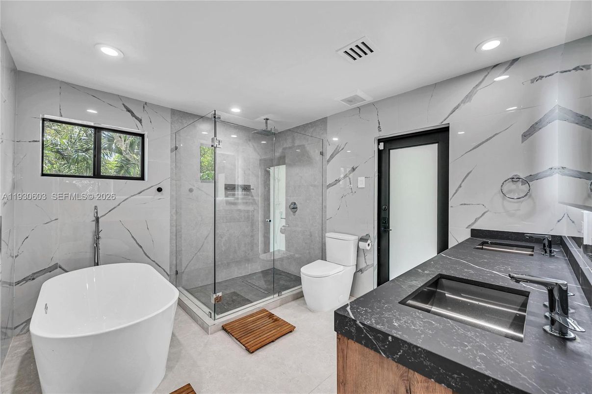 Bathroom, Free Standing Baths, Glass Shower, Interior, Marble Walls, Recessed Lighting