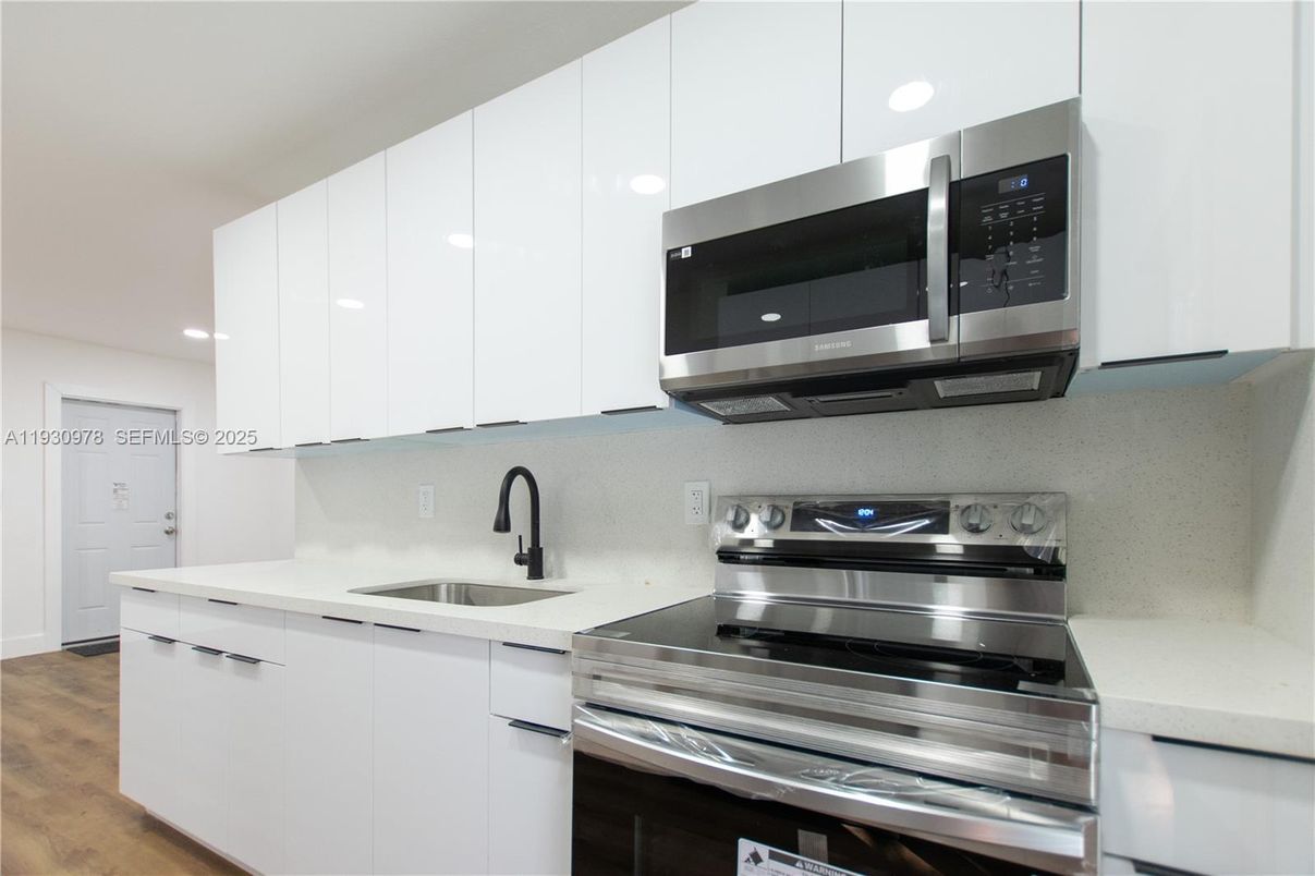 Interior, Kitchen, Recessed Lighting, Stainless Steel Appliances, Wood Texture Flooring