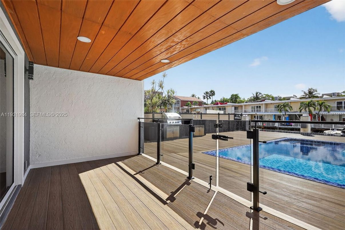 Exterior, Outdoor Kitchen, Pool, Wood Texture Flooring